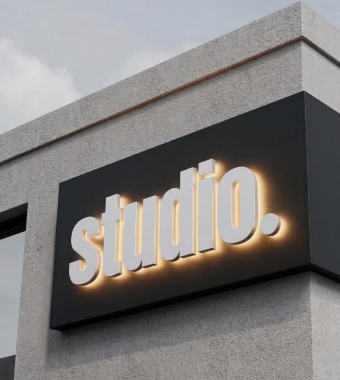 Studio front and halo-lit channel letters on a dark corner backer panel